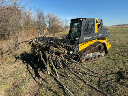 Jenkins Iron and Steel Super Duty Split Top brush grapple on John Deere 325G compact track loader clearing brush and branches in open field